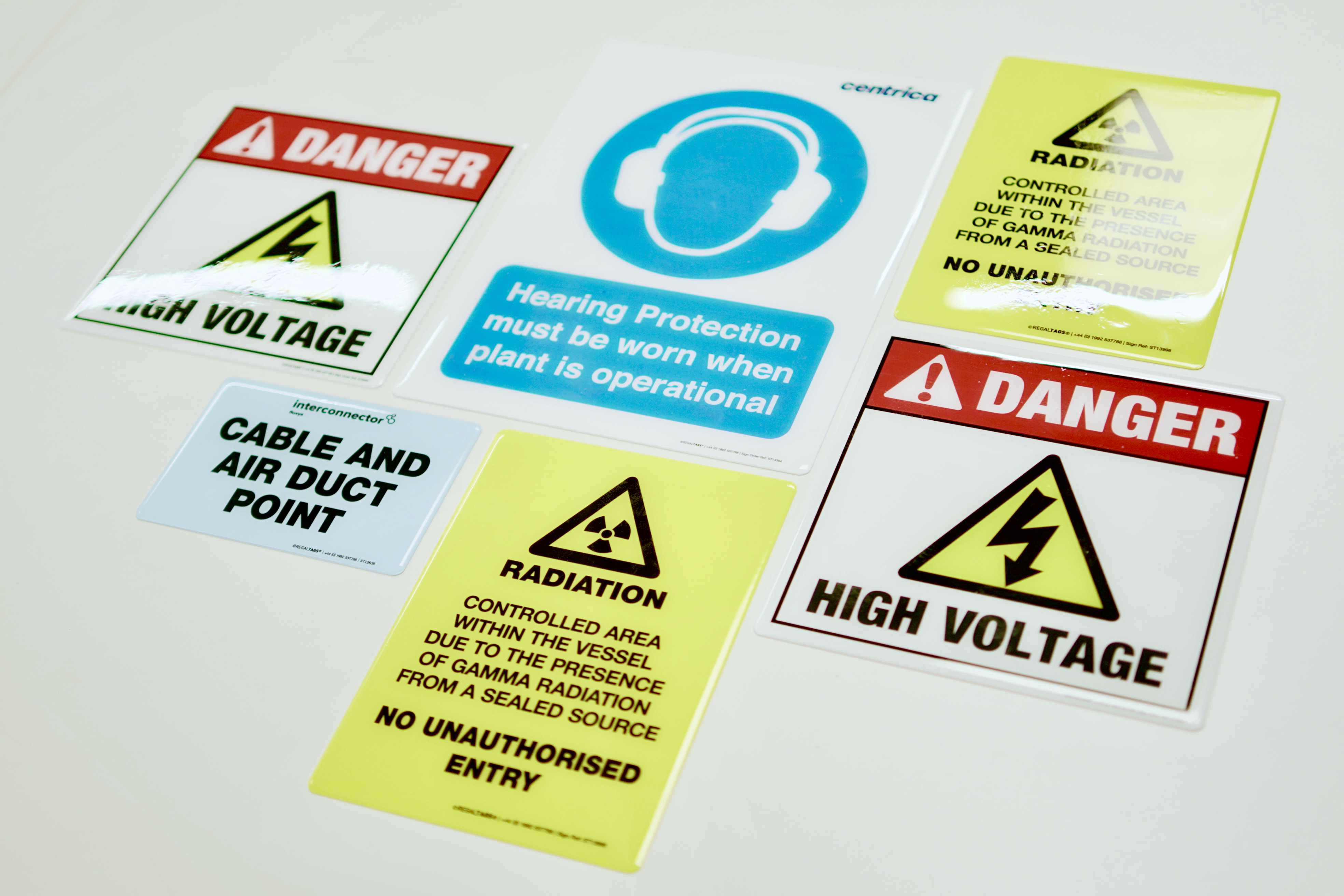 What are the 4 types of workplace safety signs, and why are